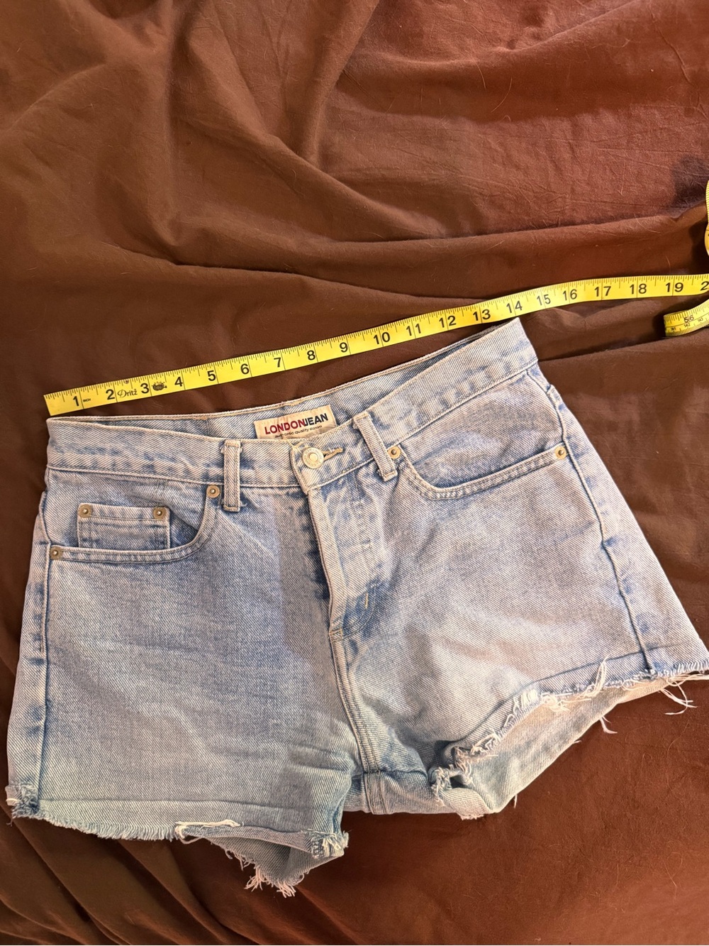 LONDONJEAN Light Blue Distressed Denim Cutoff Shorts